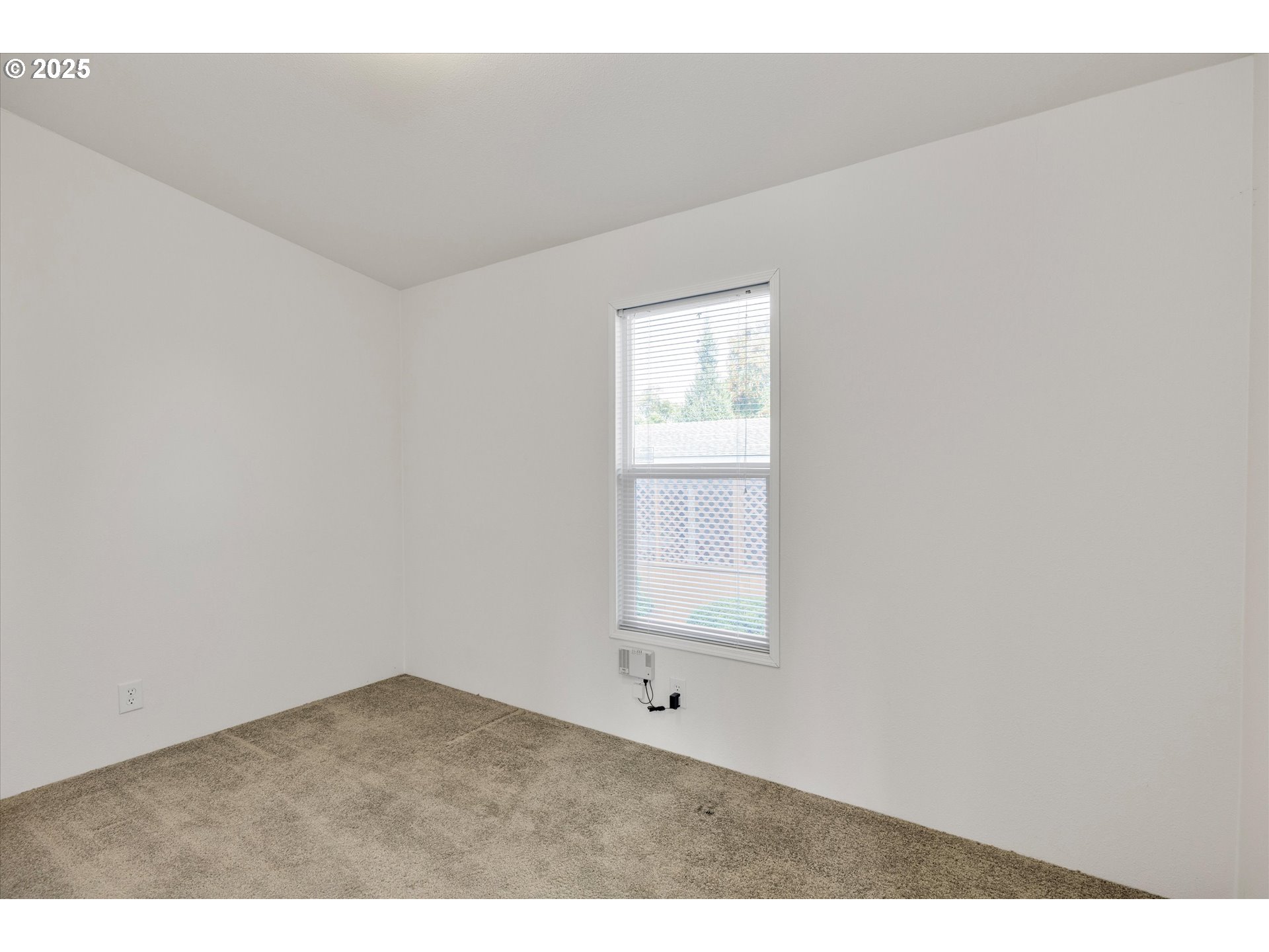 21100 Northeast Sandy Boulevard, Unit 39 Fairview, OR 97024 - Photo 18 of 23 an empty room with windows