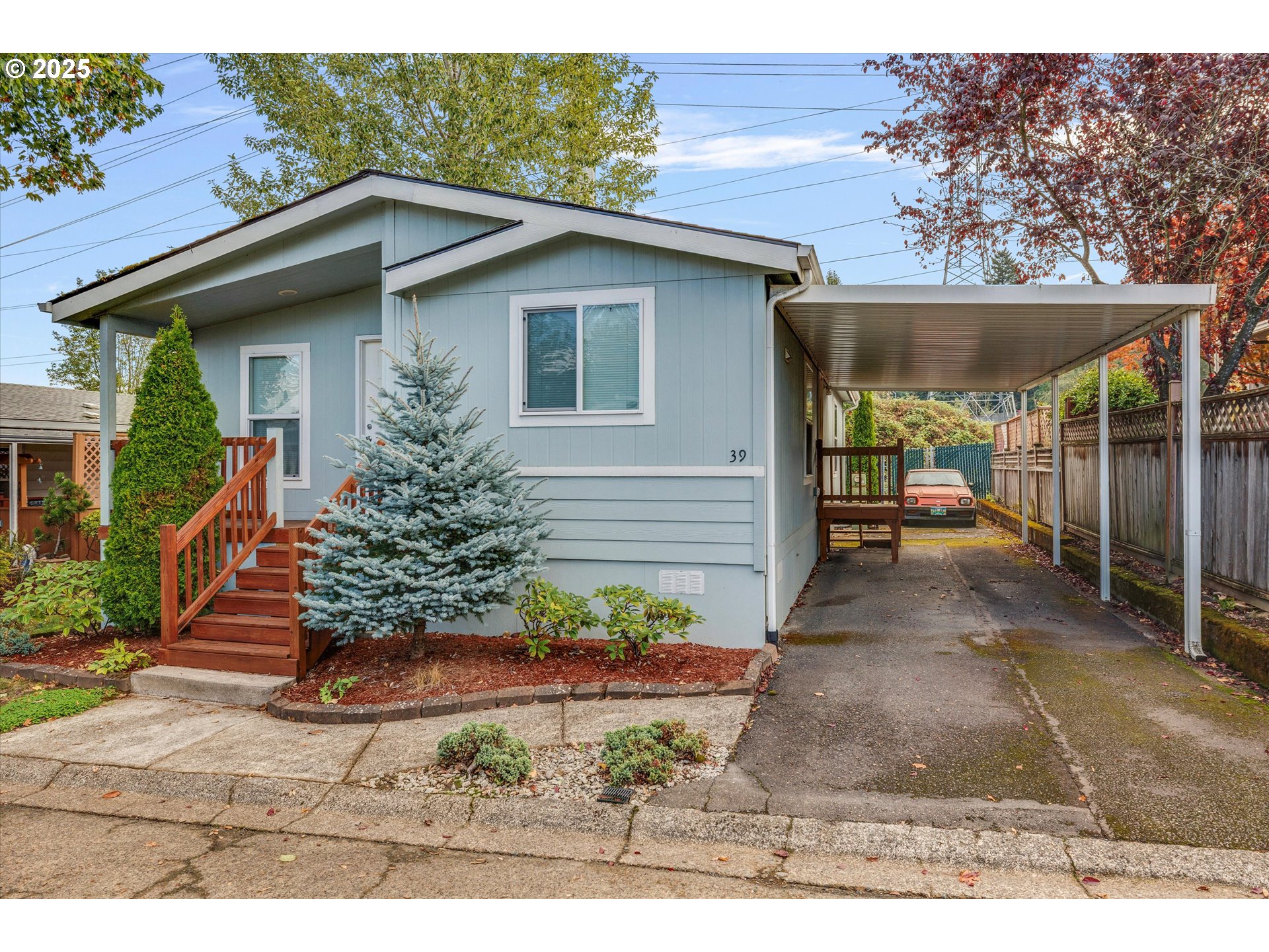 21100 Northeast Sandy Boulevard, Unit 39 Fairview, OR 97024 - Photo 3 of 23 a view of a house with porch