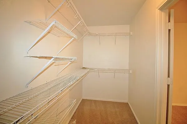 a view of a room with racks on the wall