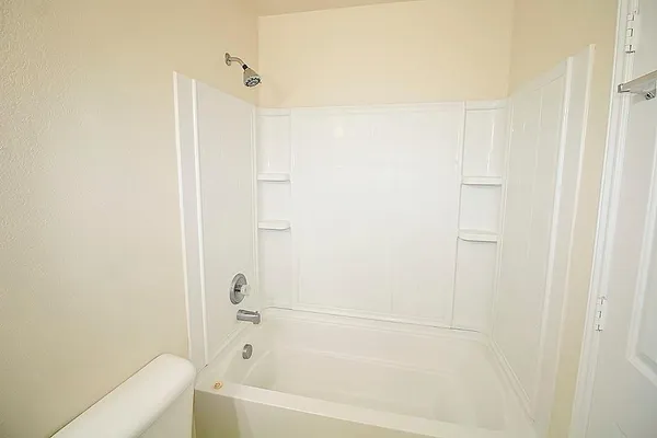 a bathroom with a bathtub