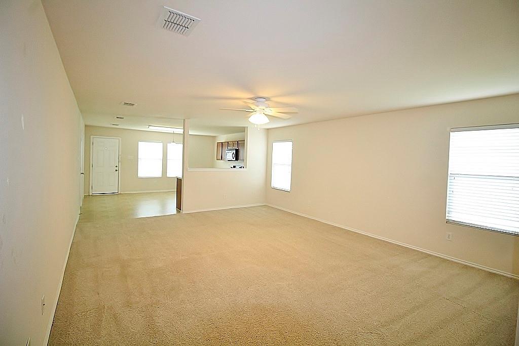 1920 J J Cheshier Road Fort Worth, TX 76247 - Photo 4 of 21 a view of an empty room with a window