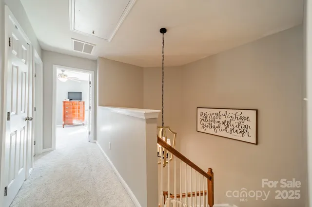 a view of a hallway with a hallway