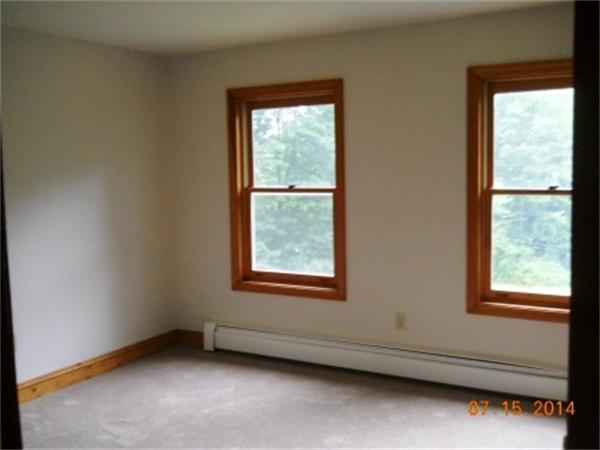 104 Lunenburg Road Townsend, MA 01474 - Photo 8 of 11 an empty room with a window