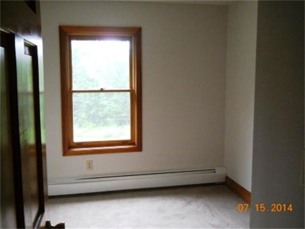 104 Lunenburg Road Townsend, MA 01474 - Photo 9 of 11 an empty room with a window