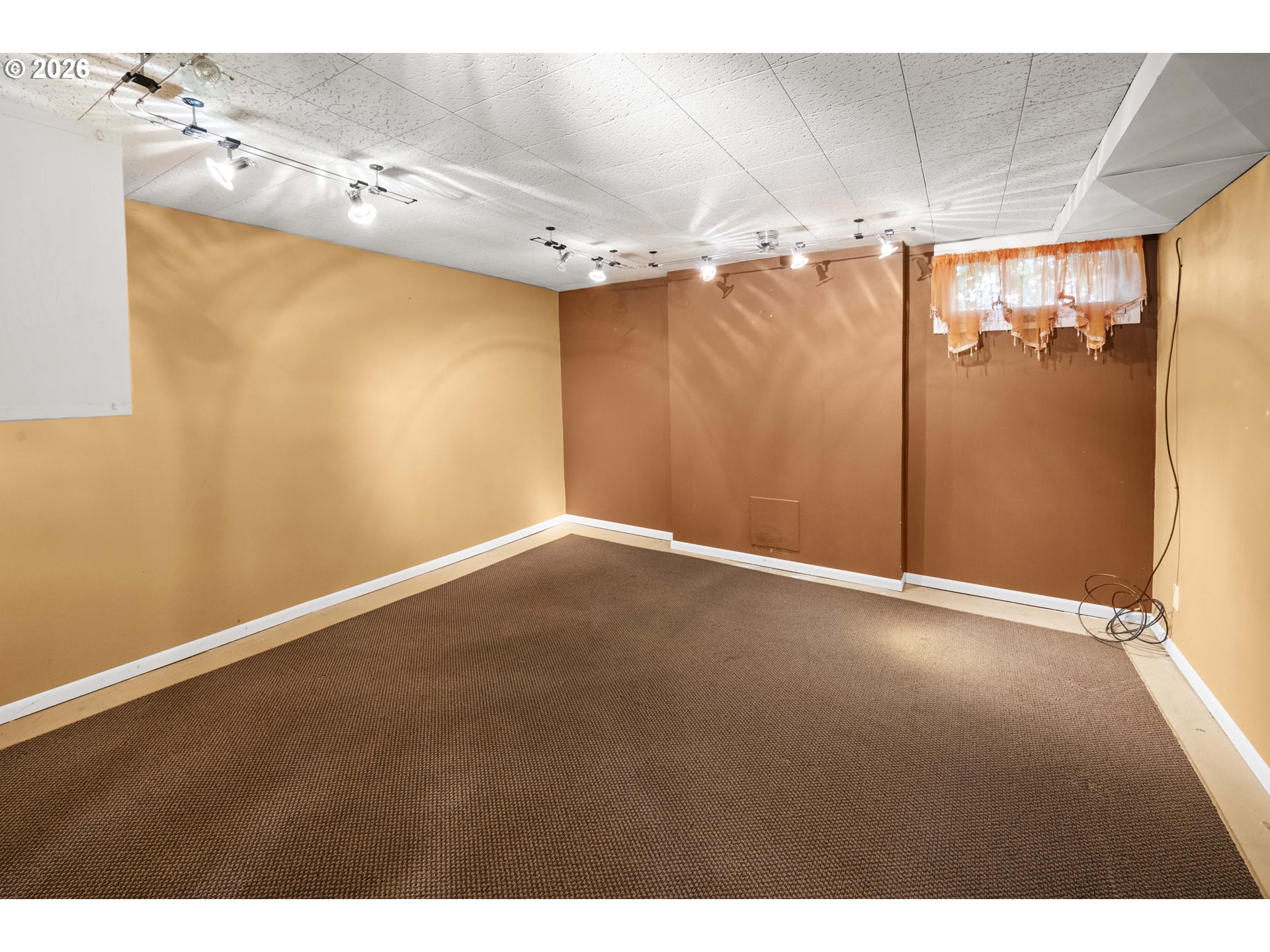 1014 8th Street Astoria, OR 97103 - Photo 19 of 25 a view of empty room with wooden floor