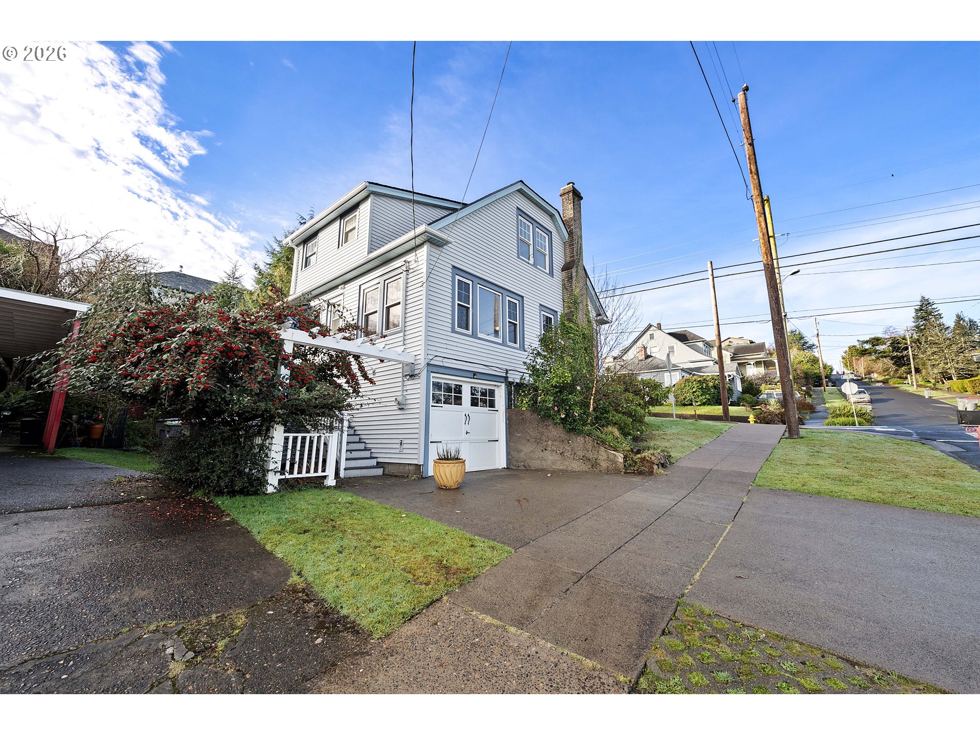 1014 8th Street Astoria, OR 97103 - Photo 20 of 25 a view of a house with a yard