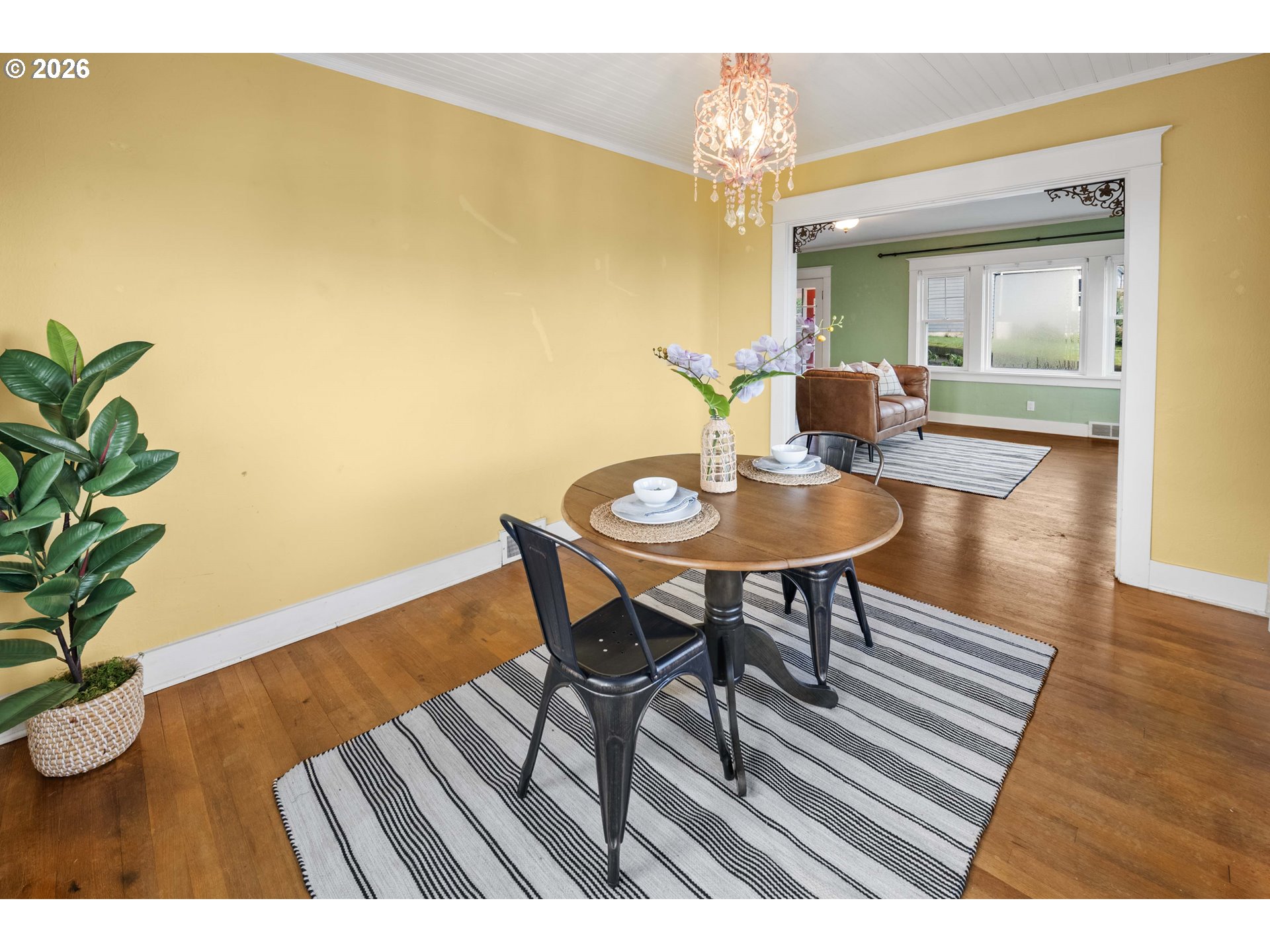 1014 8th Street Astoria, OR 97103 - Photo 5 of 25 a view of a dining room with furniture and wooden floor