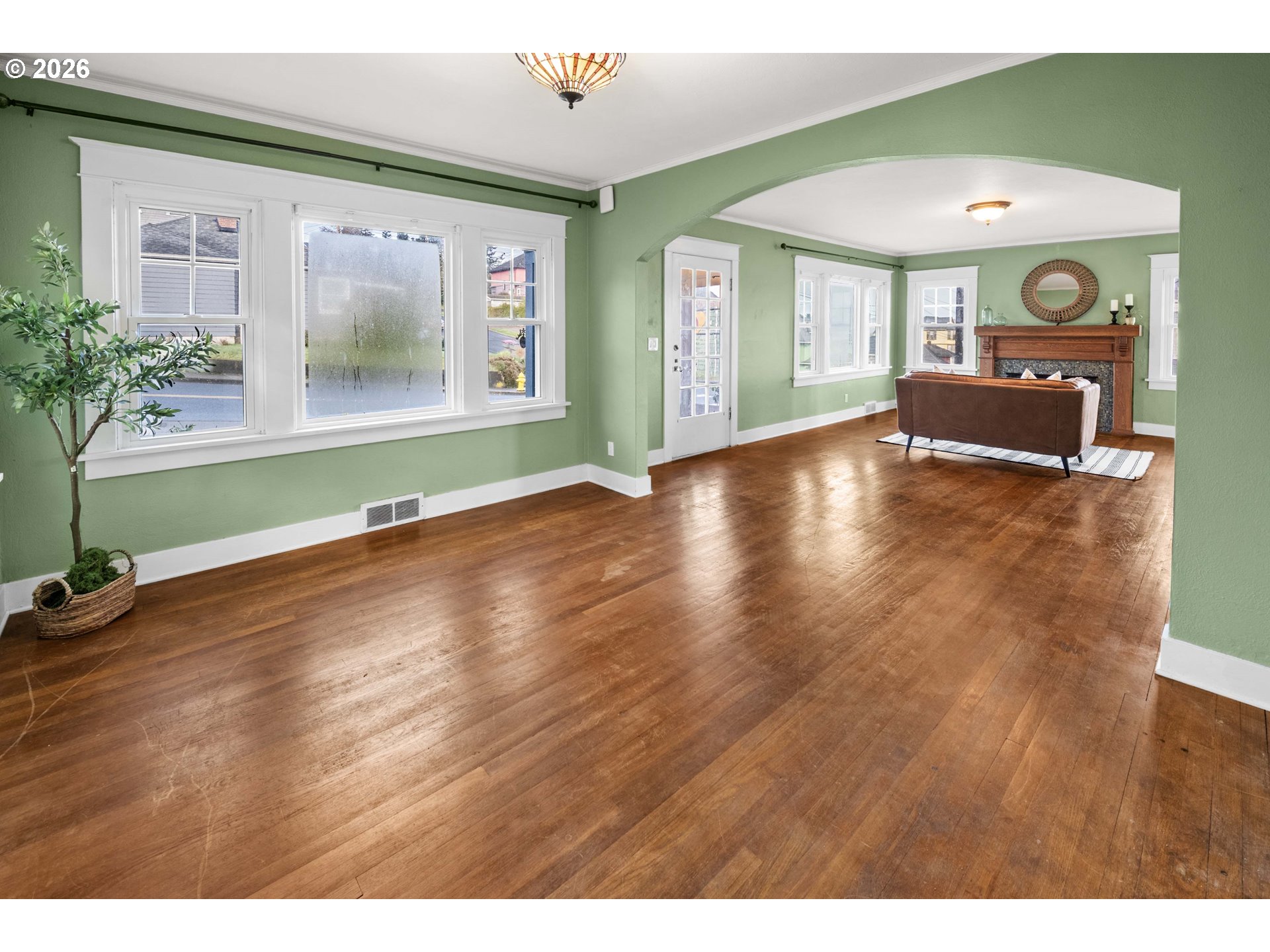 1014 8th Street Astoria, OR 97103 - Photo 7 of 25 a view of livingroom with hardwood floor and a window