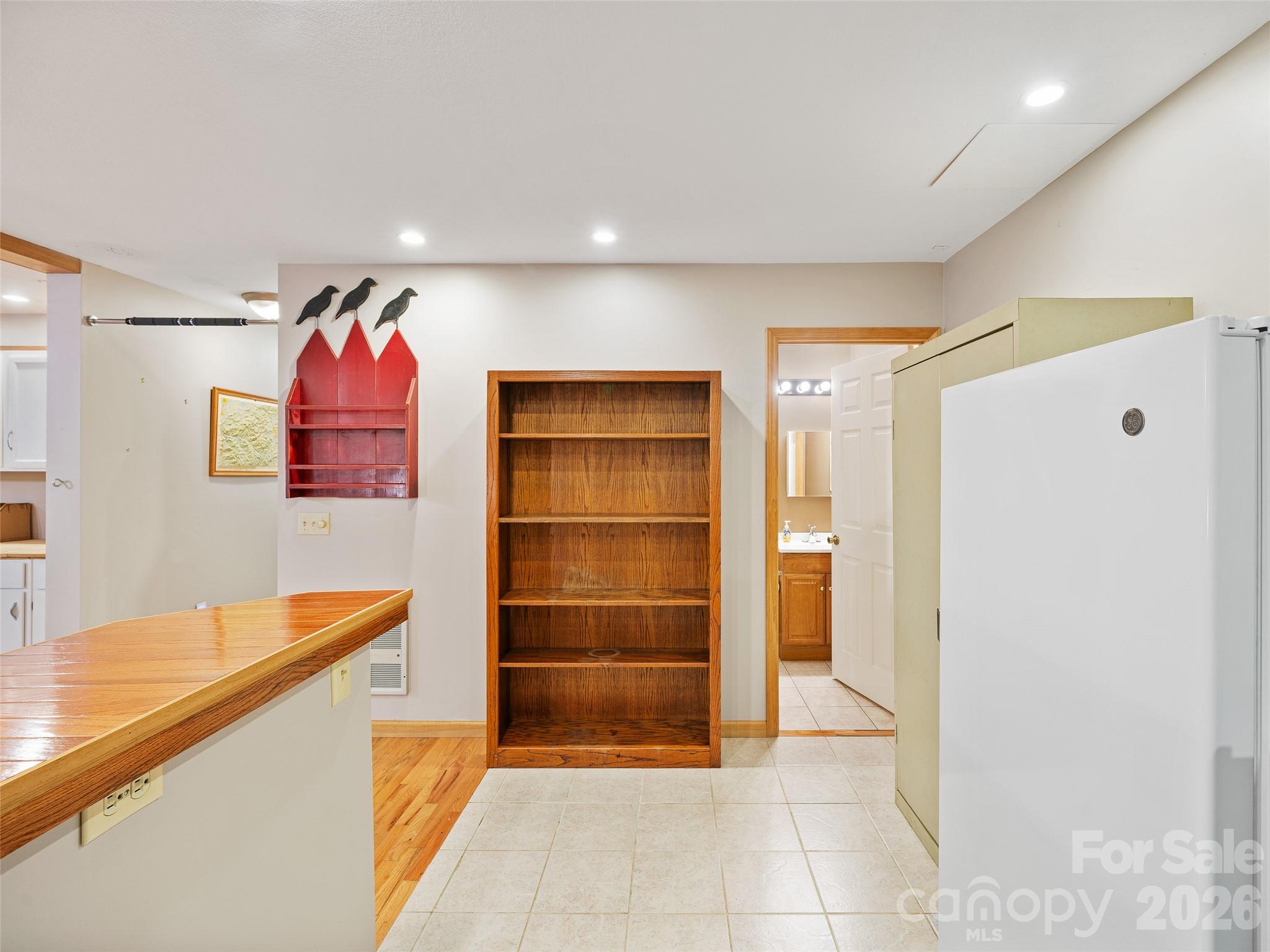 142 Wildflower Road Spruce Pine, NC 28777 - Photo 26 of 46 a workspace with furniture and closet