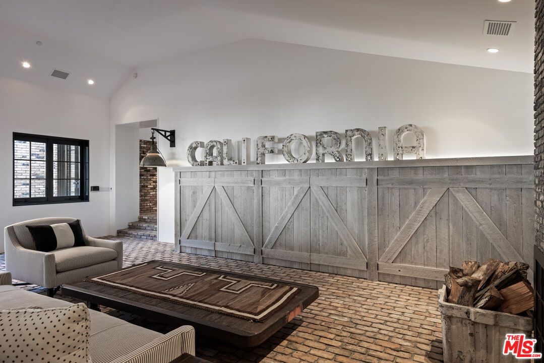 13215 Riviera Ranch Road Los Angeles, CA 90049 - Photo 13 of 37 a living room with furniture