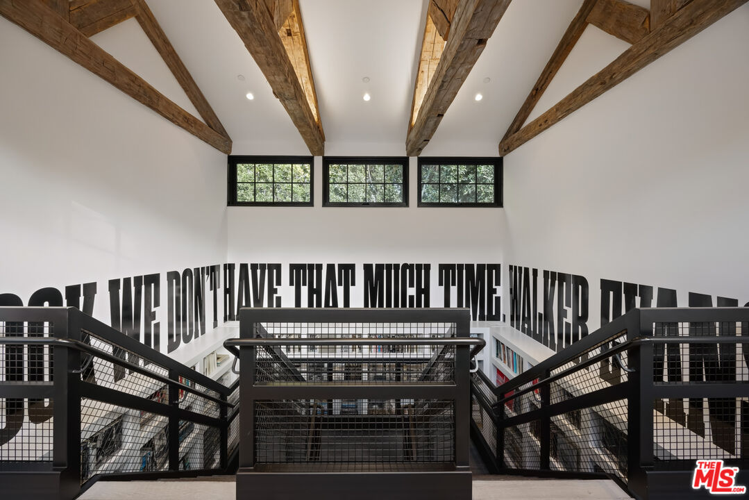 13215 Riviera Ranch Road Los Angeles, CA 90049 - Photo 18 of 37 a view of a balcony