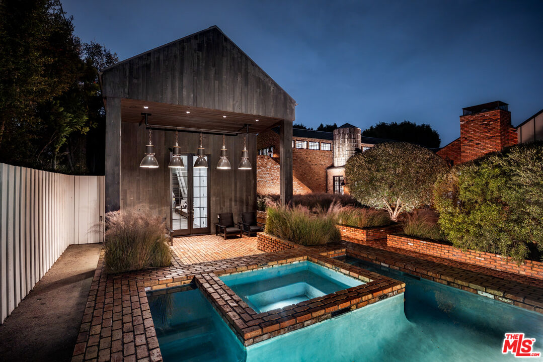 13215 Riviera Ranch Road Los Angeles, CA 90049 - Photo 34 of 37 a view of outdoor space with seating area