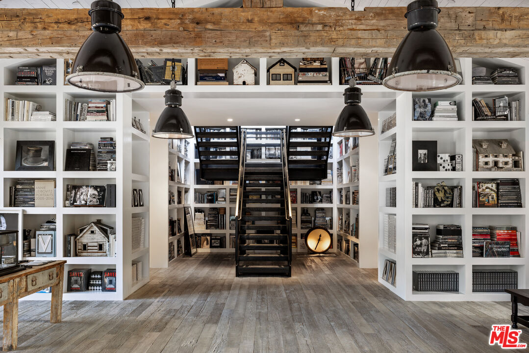 13215 Riviera Ranch Road Los Angeles, CA 90049 - Photo 6 of 37 a view of dinning room with shelves