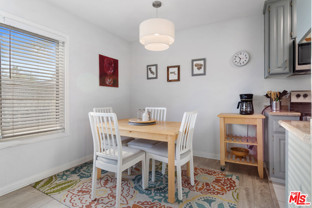 2002 4th Street, Unit 312 Santa Monica, CA 90405 - Photo 5 of 22 a view of a dining room with furniture
