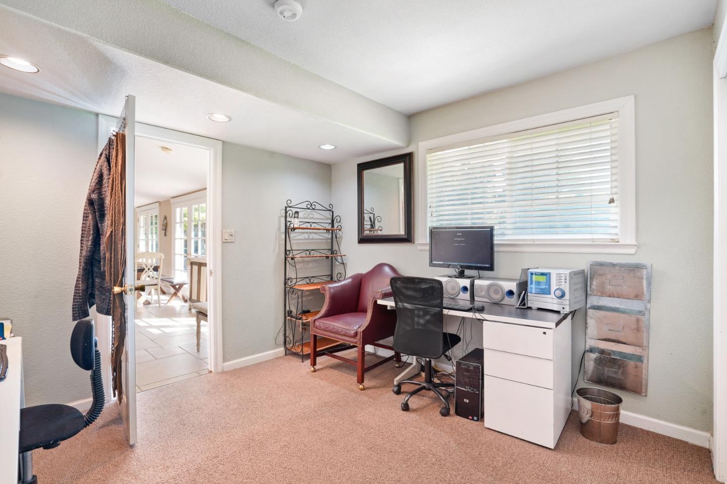 14160 Miranda Road Los Altos Hills, CA 94022 - Photo 13 of 30 a view of a workspace with furniture and a window