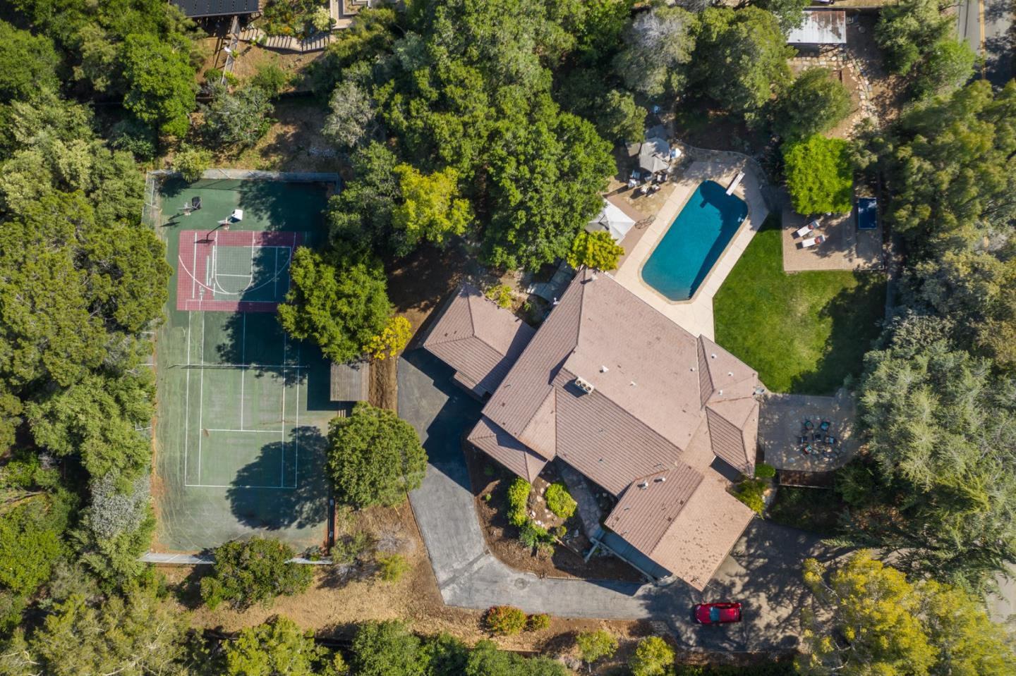 14160 Miranda Road Los Altos Hills, CA 94022 - Photo 2 of 30 an aerial view of a house with a yard and garden