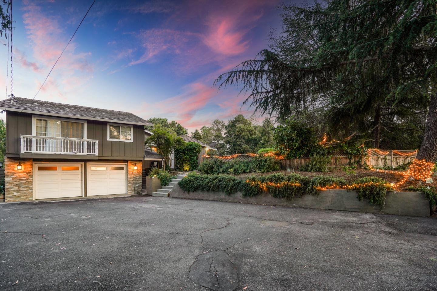 14160 Miranda Road Los Altos Hills, CA 94022 - Photo 22 of 30 a view of a house with a backyard