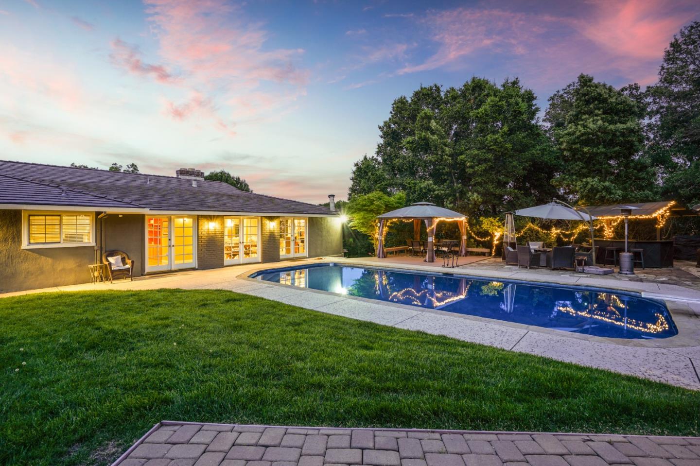 14160 Miranda Road Los Altos Hills, CA 94022 - Photo 23 of 30 a view of a house with a swimming pool