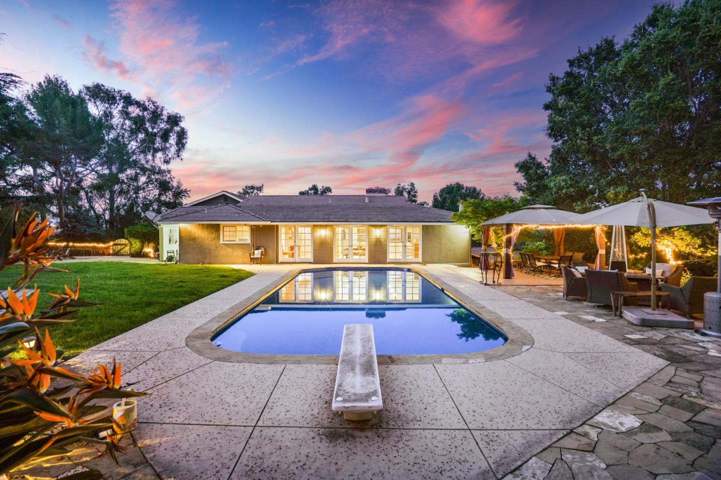 14160 Miranda Road Los Altos Hills, CA 94022 - Photo 27 of 30 a view of a swimming pool with lawn chairs and a fire pit
