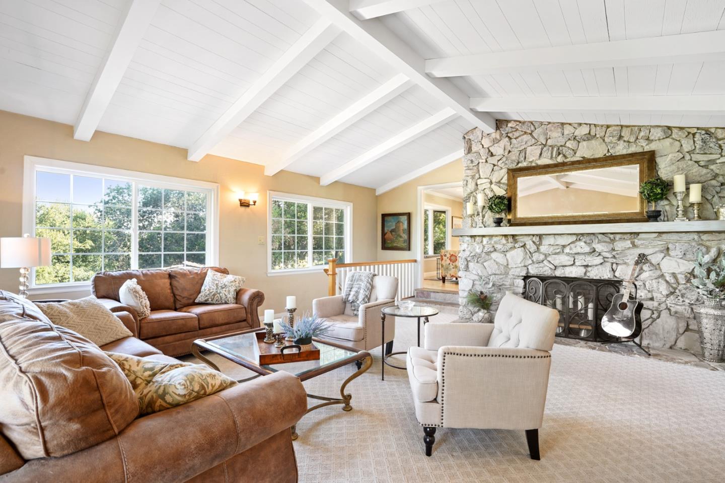 14160 Miranda Road Los Altos Hills, CA 94022 - Photo 9 of 30 a living room with furniture a fireplace and a large window