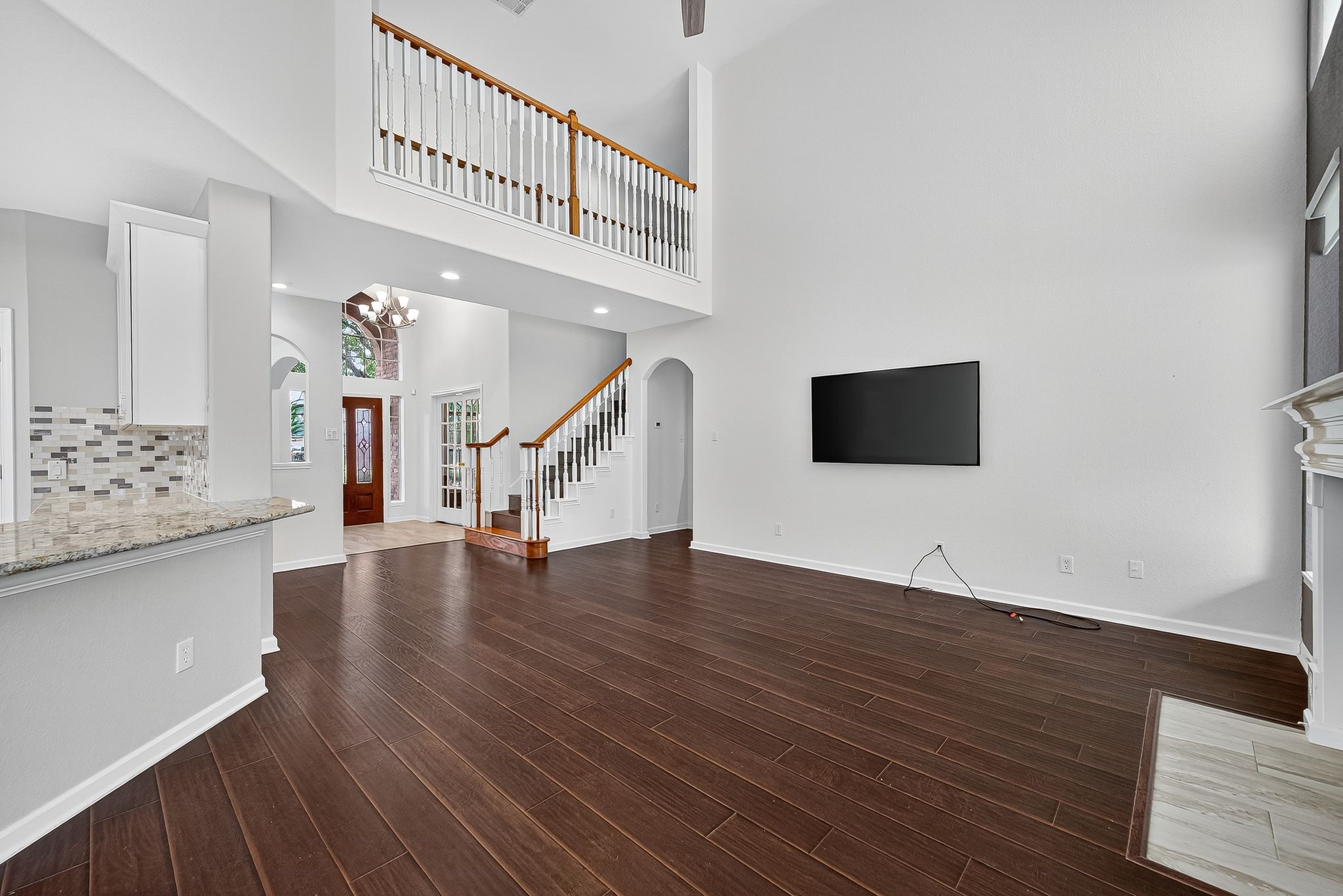 22406 Piper Terrace Lane Katy, TX 77450 - Photo 17 of 44 a view of entryway and hall with wooden floor