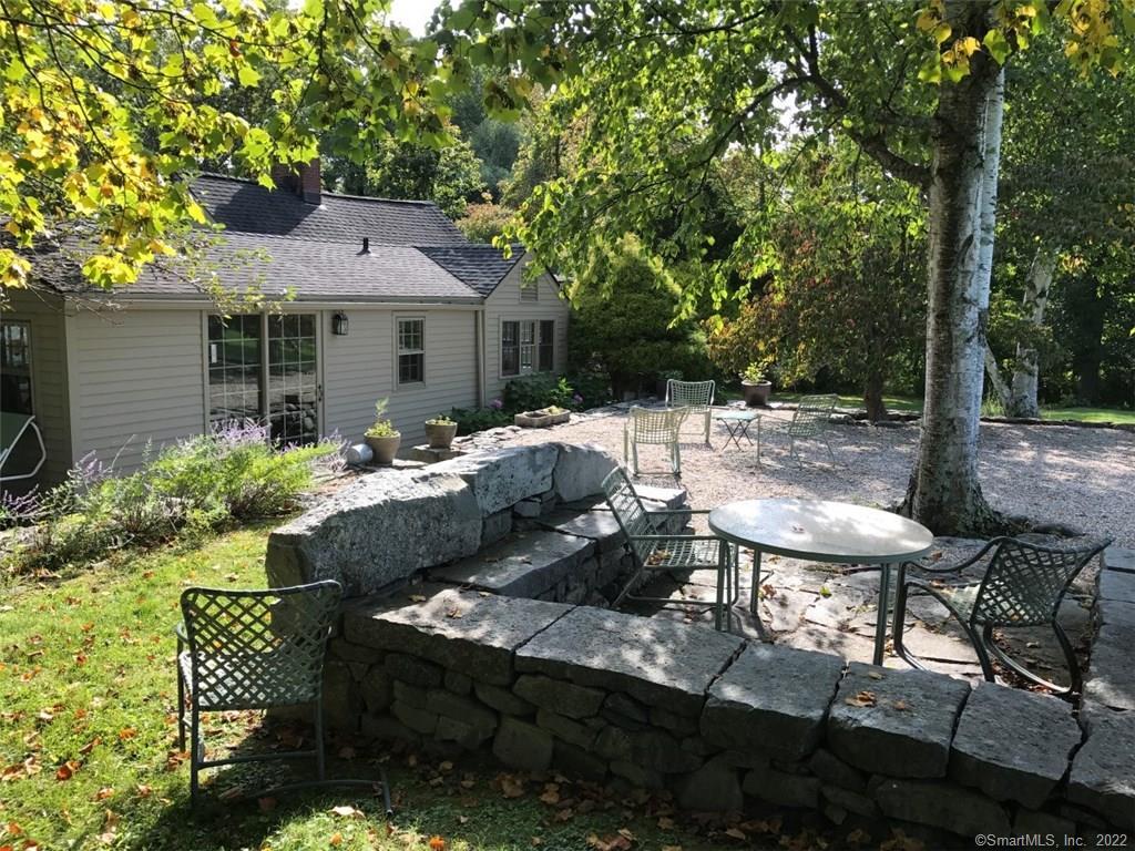 22 Dug Road Sharon, CT 06069 - Photo 1 of 1 a view of backyard of house with seating space