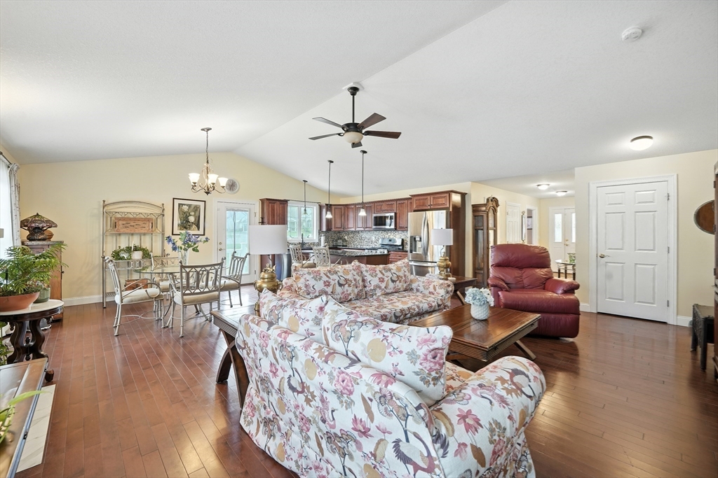 46 Palmer Road, Unit 28 Monson, MA 01057 - Photo 14 of 38 a living room with furniture and wooden floor