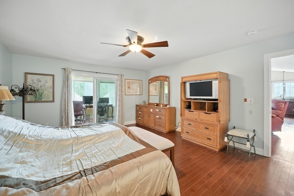 46 Palmer Road, Unit 28 Monson, MA 01057 - Photo 19 of 38 a bedroom with furniture and a window