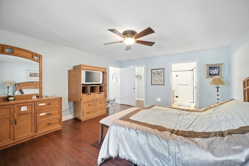 46 Palmer Road, Unit 28 Monson, MA 01057 - Photo 21 of 38 a bedroom with a bed and a furniture