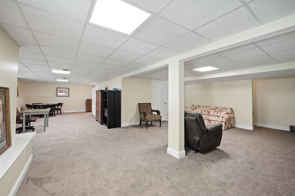 46 Palmer Road, Unit 28 Monson, MA 01057 - Photo 28 of 38 a living room with furniture and a furniture