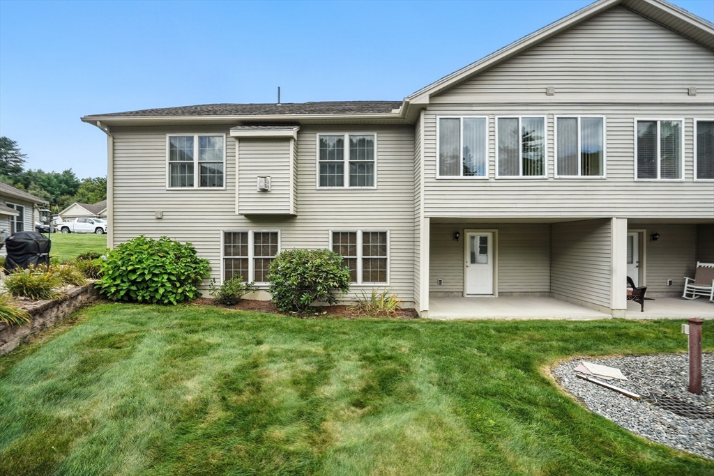 46 Palmer Road, Unit 28 Monson, MA 01057 - Photo 35 of 38 a front view of a house with a yard