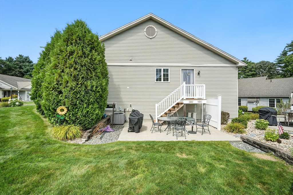 46 Palmer Road, Unit 28 Monson, MA 01057 - Photo 37 of 38 a view of a house with a yard