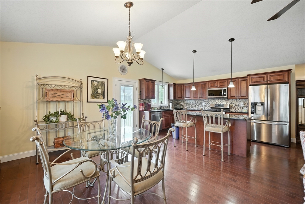 46 Palmer Road, Unit 28 Monson, MA 01057 - Photo 10 of 38 a view of a dining room with furniture kitchen and wooden floor