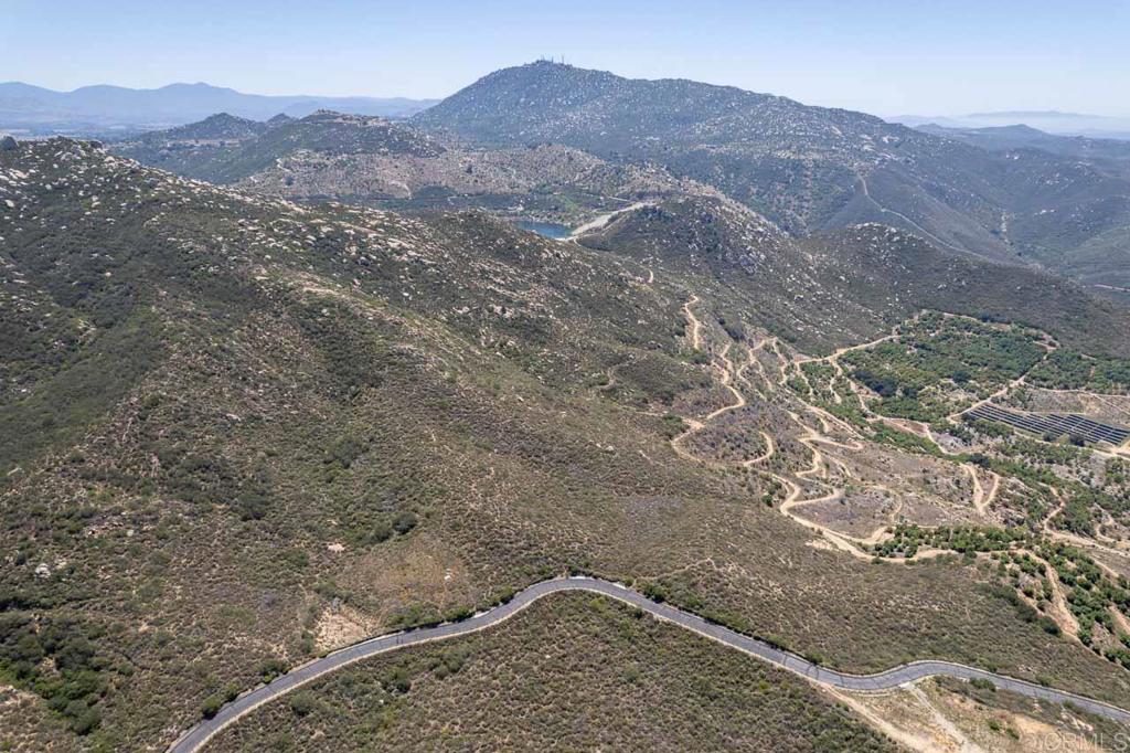 18055 Sunset Point Poway, CA 92064 - Photo 32 of 39 a view of a mountain in the distance in a field
