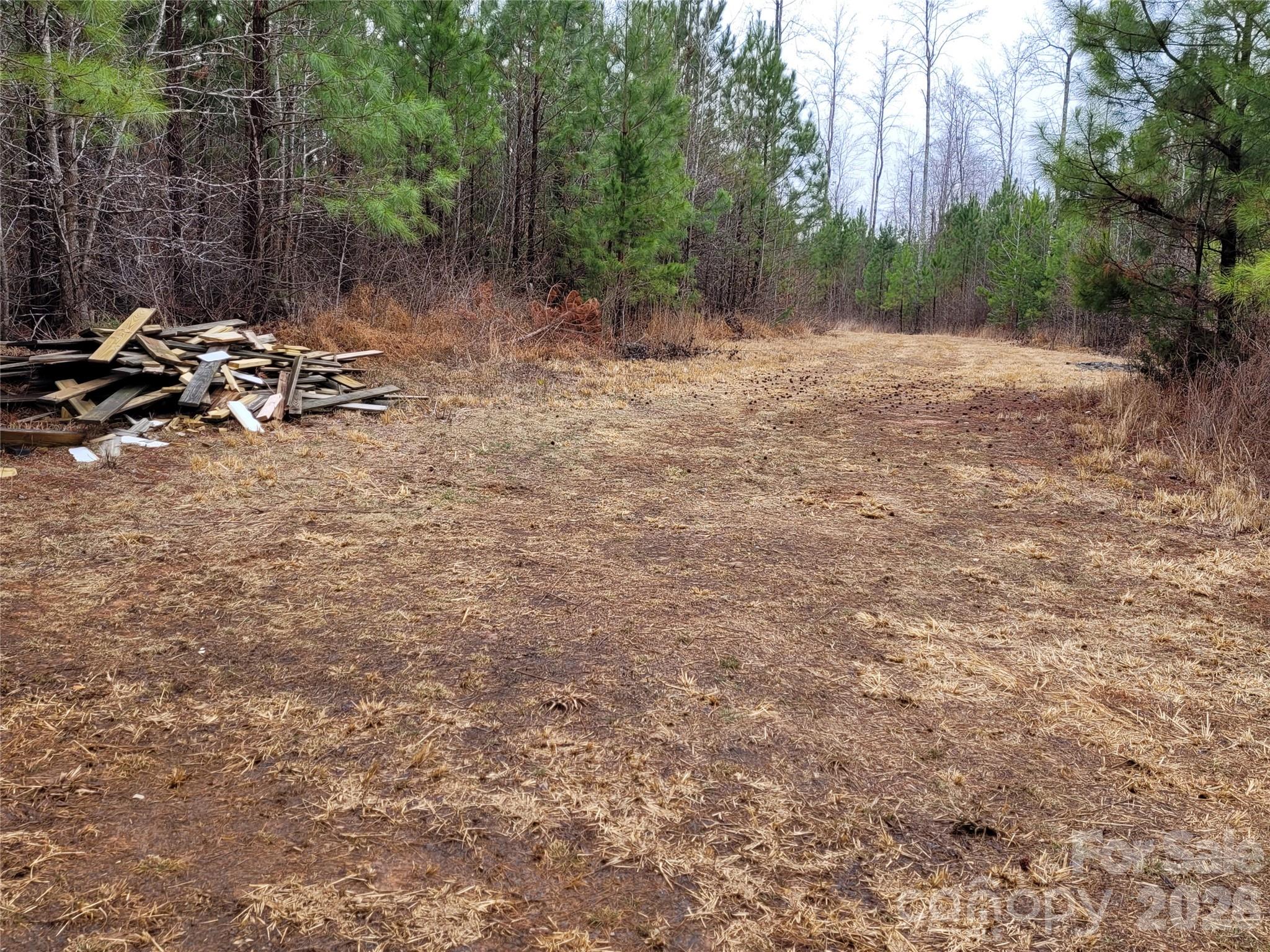0 North Frazier Road Mebane, NC 27302 - Photo 7 of 8 a view of a backyard with a bench