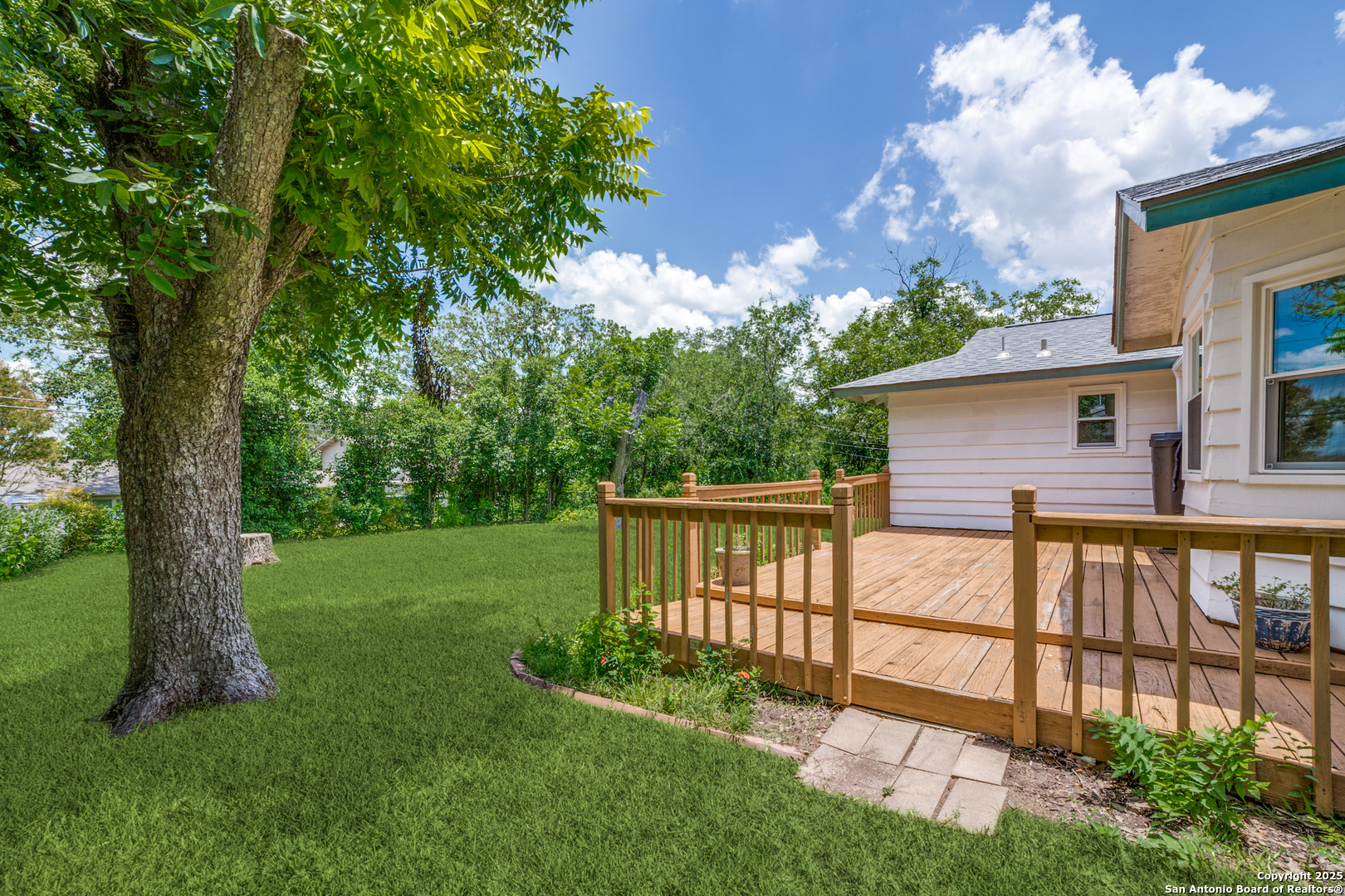 3323 Old Forge San Antonio, TX 78230 - Photo 25 of 26 a view of backyard with a garden and deck