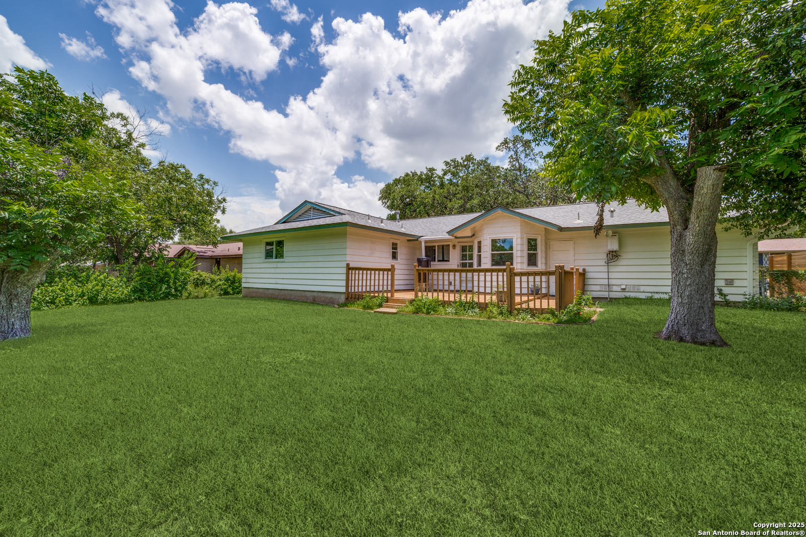 3323 Old Forge San Antonio, TX 78230 - Photo 26 of 26 a view of house with backyard and garden