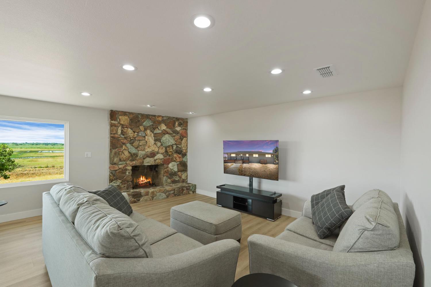 2650 West Twitchell Island Road Rio Vista, CA 94571 - Photo 7 of 60 a living room with furniture and a large window