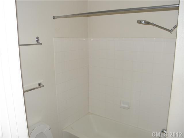 606 Stone Village Drive, Unit 606 Fort Mill, SC 29708 - Photo 8 of 11 a bathroom with a shower