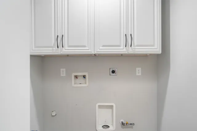 a backyard of a house with outdoor seating