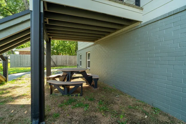 a view of a lake with houses in the back
