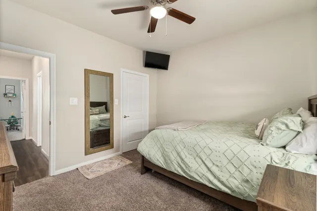 a bathroom with a double vanity sink a mirror and a