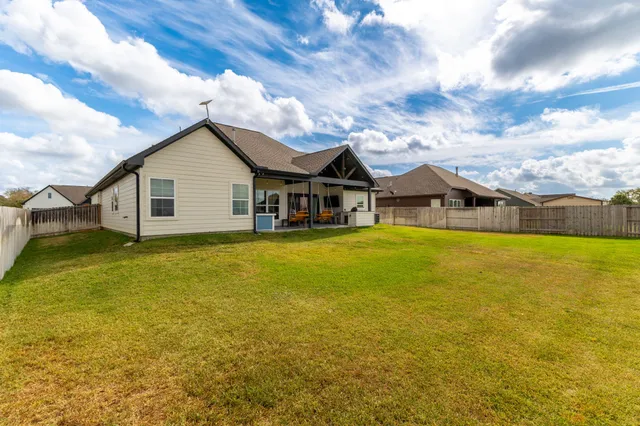 a house view with a garden space