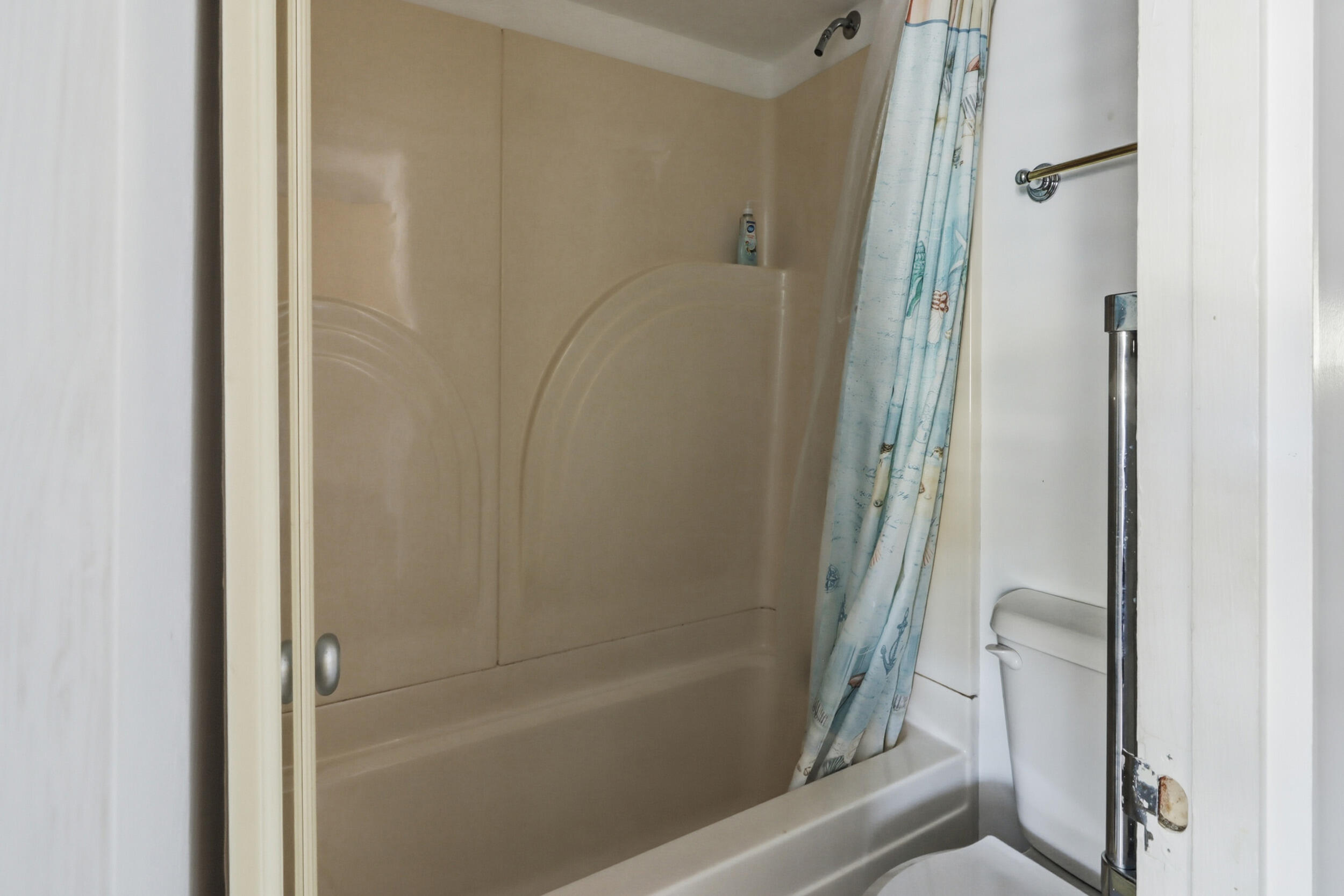 169 Shore Road, Unit 15 Truro, MA 02666 - Photo 7 of 12 a bathroom with a bathtub