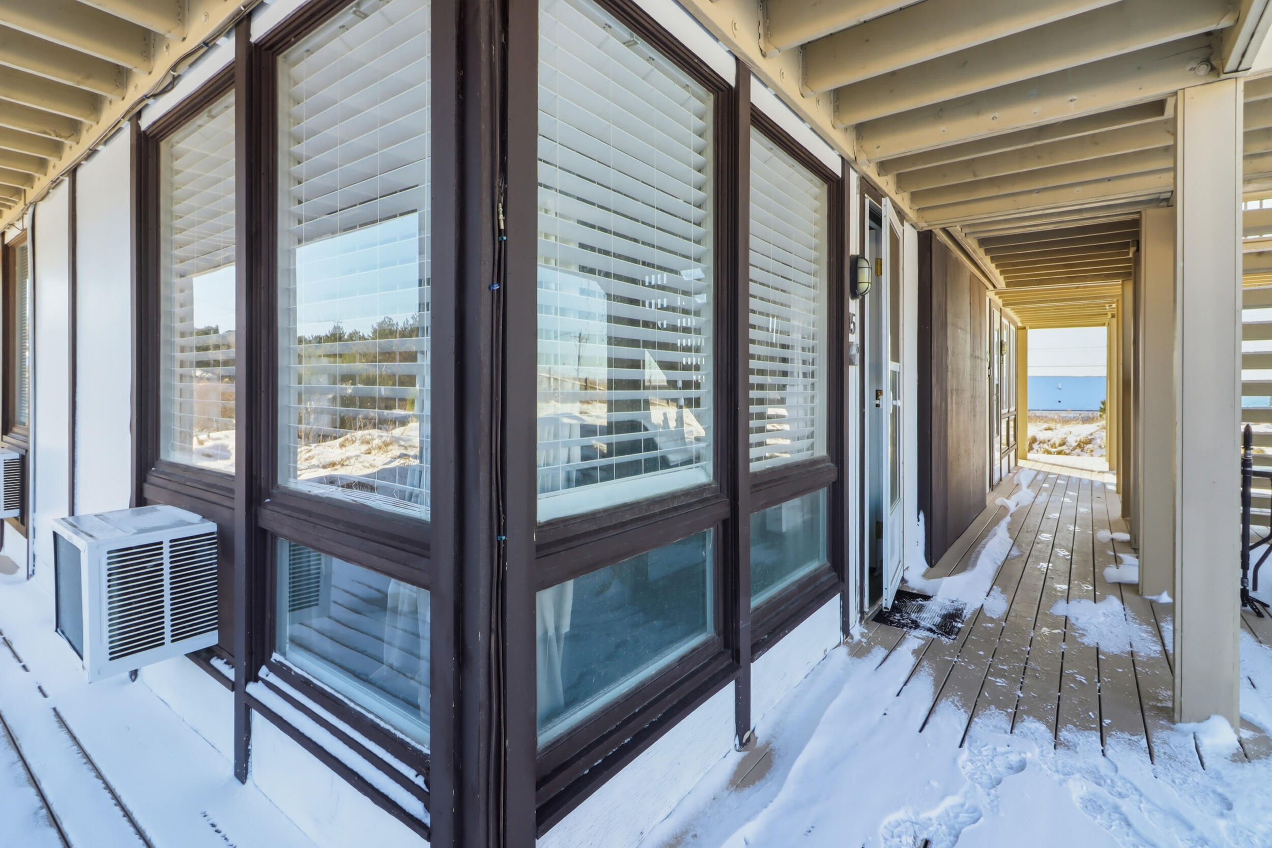 169 Shore Road, Unit 15 Truro, MA 02666 - Photo 8 of 12 a view of front door and deck of the house