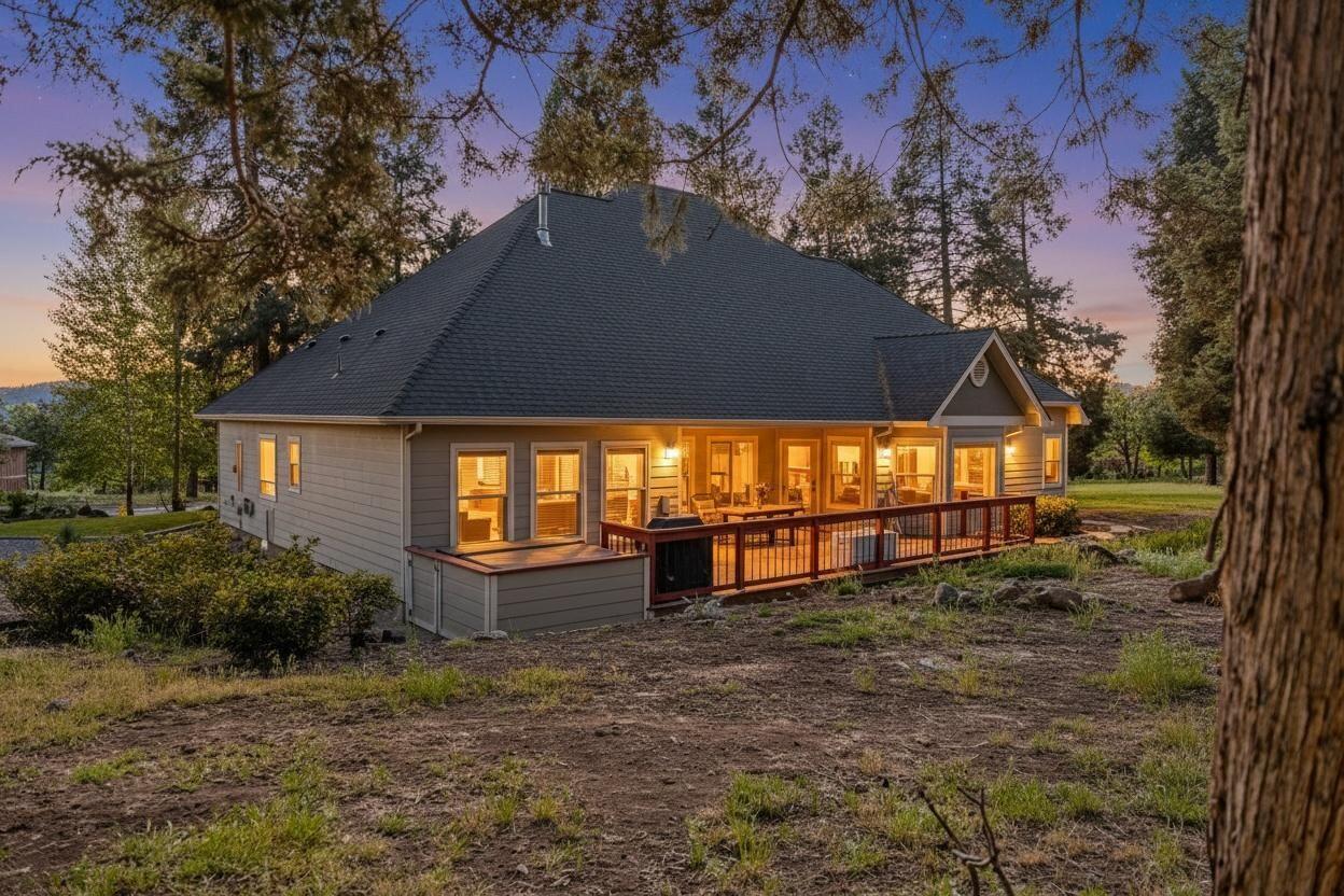 10421 Kestrel Road Klamath Falls, OR 97601 - Photo 2 of 56 a view of a house with a yard