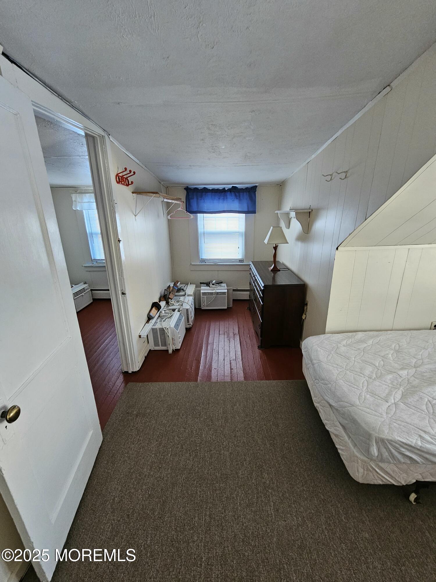 207 3rd Avenue, Unit REAR Belmar, NJ 07719 - Photo 13 of 13 a living room with furniture and a couch