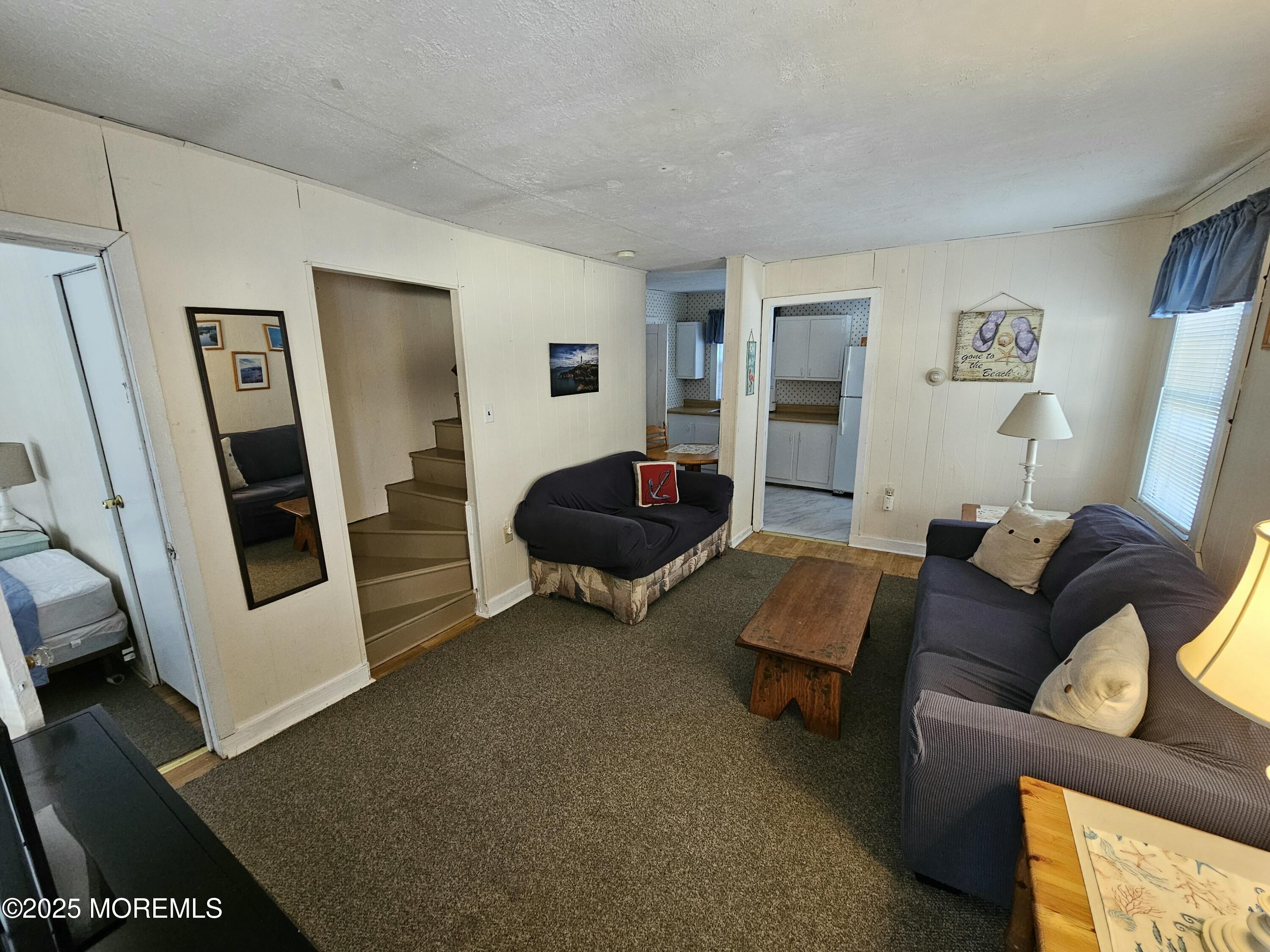 207 3rd Avenue, Unit REAR Belmar, NJ 07719 - Photo 4 of 13 a living room with furniture and a couch