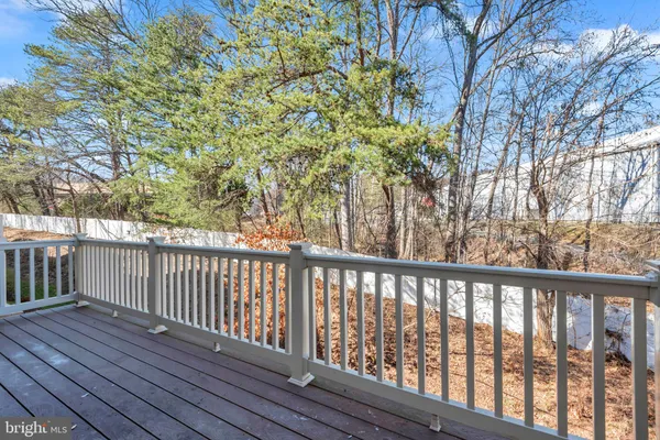 a view of balcony with wooden floor