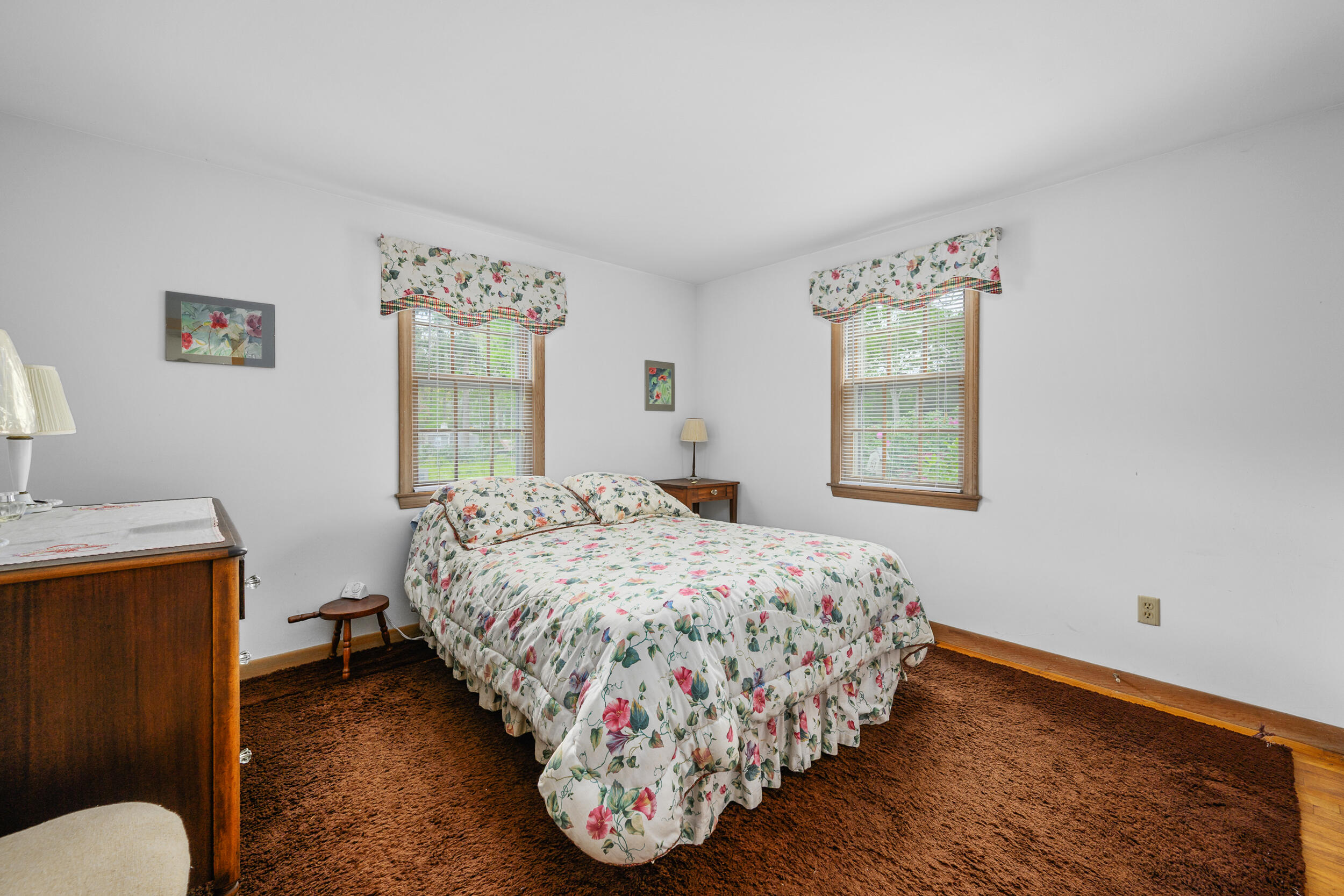 59 Beverly Road West Yarmouth, MA 02673 - Photo 24 of 33 a bedroom with a bed and a window